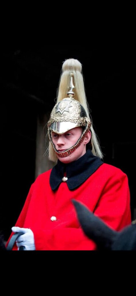 Michael Dall in Household Cavalry ceremonial uniform, before founding MD Falconry's golf course bird control service
